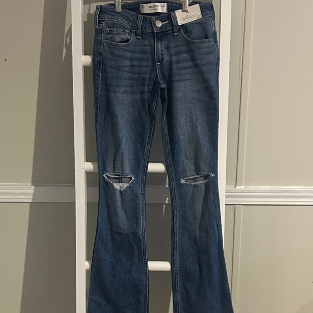 Hollister woman’s Blue Bootcut Jeans with Ripped Details